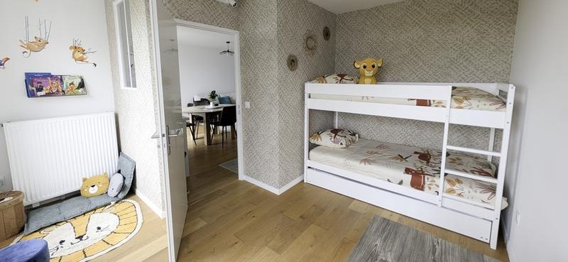 Bedroom 2 with bunk beds and Lion King decals